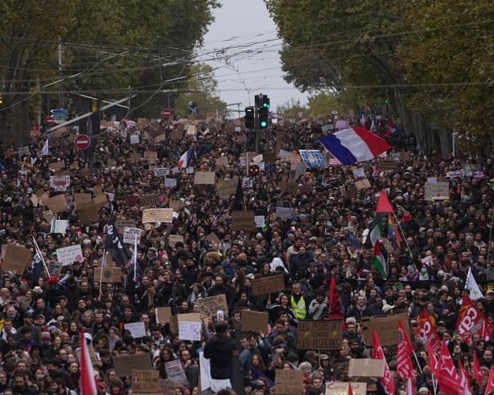 Image accompanying the story: Hundreds of thousands march across France in protests over schools and policing
