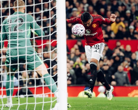 Casemiro of Manchester United heads home to score his side’s second goal.
