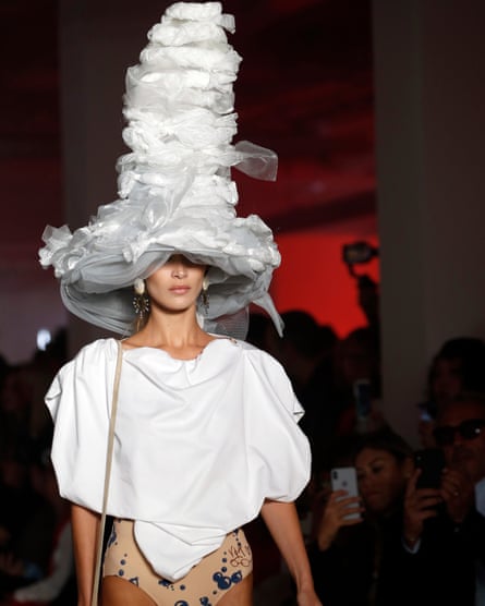 Model walks the Vivienne Westwood runway in a giant fish hat at Paris  Fashion Week