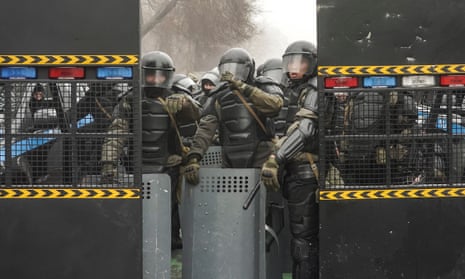 Riot police officers in Almaty