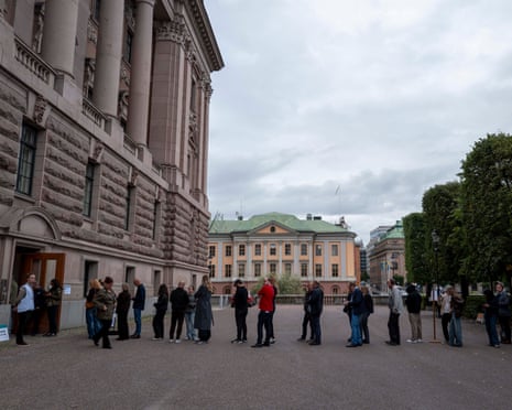 Voters cast their ballots at a polling station inside the Swedish Parliament in Stockholm on election day.