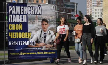 A campaign banner of a candidate in the Moscow city elections.