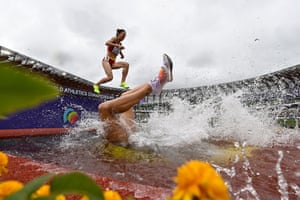 Germany’s Lea Meyer (R) falling in the women’s 3,000m steeplechase heats during the World Athletics Championships at Hayward Field in Eugene, Oregon on 16 July 2022