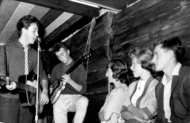 Paul McCartney on John Lennon, then still known as the Quarrymen perform at their first concert at the Casbah Coffee House on August 29, 1959 in Liverpool, England.