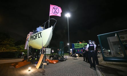 Extinction rebellion protestors blockade Newprinters publishing factory in Knowsley, Liverpool, last Friday.