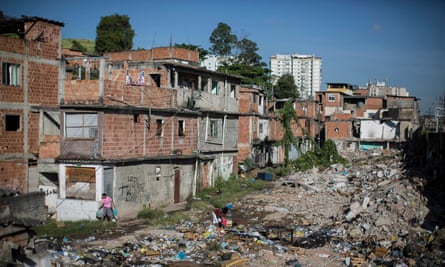 Trash fills an area in the Favela do Metro slum outside Maracana stadium where some lost their homes two years ago for the area to be renovated for the 2014 World Cup and 2016 Olympics. Some people have reoccupied the homes and are fighting to stay.