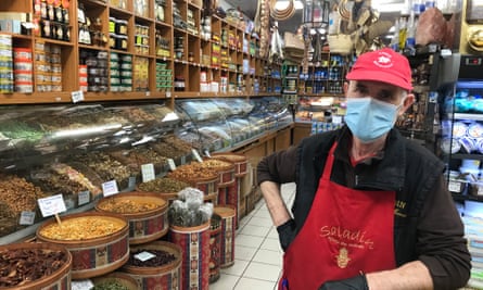 Masked man at Saladin spice shop in Noailles