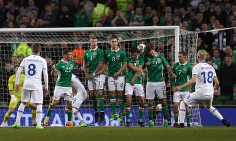 Hordur Magnusson, right, scores Iceland’s winning goal from a free-kick against Republic of Ireland.