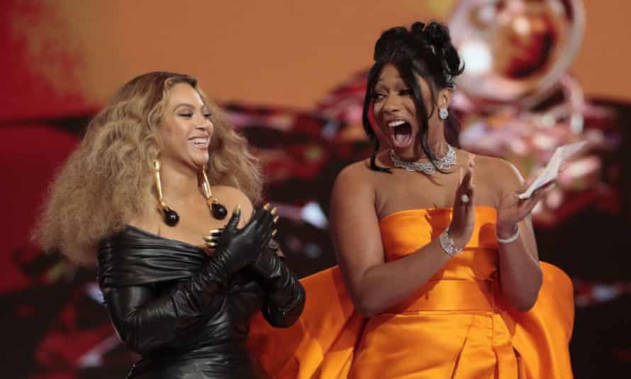 Universal star Megan Thee Stallion onstage with Beyoncé for one of three Grammys she won at this year's awards.