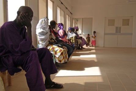 People suffering from HIV wait to be treated by Yahya Jammeh at Serrekunda hospital in Banjul, capital of the Gambia, in 2007