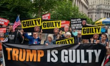 Protestors holding signs that say "guilty" and "Trump is guilty". Jury Finds Former President Donald Trump Guilty On All 34 Counts In Hush Money Trial