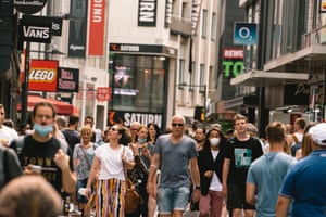 Shoppers in Cologne city centre in July