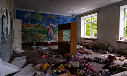 Toys strewn across the floor of a damaged orphanage in Shevchenkove