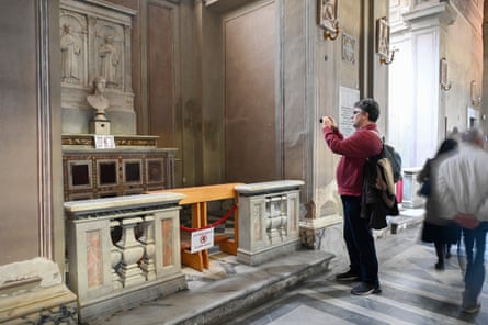 Fabio Orazzo takes a picture of the Christ the Saviour sculpture
