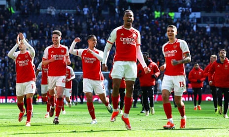 Arsenal players celebrate their 3-2 win at Tottenham in late April