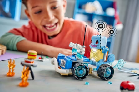 A boy plays with one of the sets