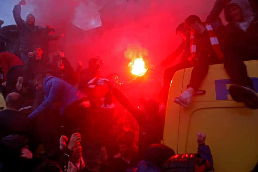 FIFAPRO Tom Jenkins’s best sports photos of 2018 11 Liverpool fans with flares on top of police vans outside the Arkells pub before the Liverpool v Roma Champions League semi-final 1st leg at Anfield in April 2018