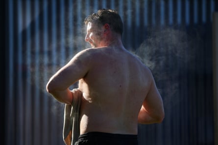 Gordon Baker dries off after a sauna