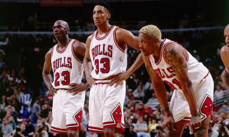 Dennis Rodman (right) alongside Michael Jordan and Scottie Pippen during his time with the Chicago Bulls