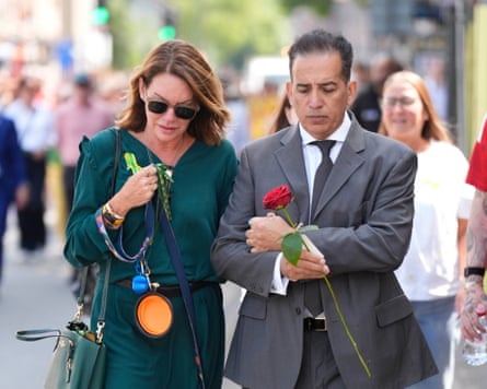 Emma Webber, the mother of Barnaby Webber, and Dr Sanjoy Kumar, the father of Grace O’Malley Kumar, at a memorial walk to lay flowers in Nottingham
