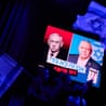 images of Benjamin Netanyahu and Gadi Eisenkot on a big screen in Tel Aviv
