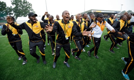 The Matabeleland squad dance and sing as they parade round the pitch before the Barawa v Tamil Eelam.