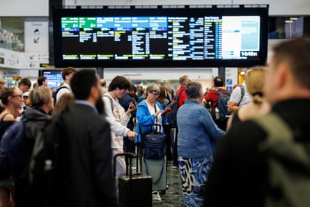 People waiting at Euston station as travel disrupted by Storm Floris