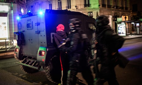 RAID policemen arrest a man during clashes with police the Lyon streets.
