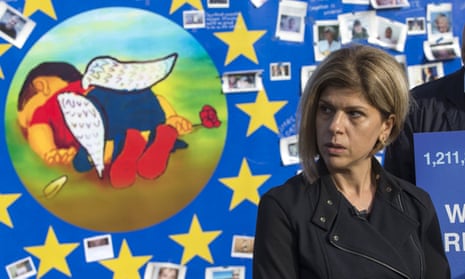 Canadian Tima Kurdi, aunt of Aylan Kurdi, reacts in front of a painting depicting the drowned Syrian child during a demonstration in Brussels<br>
