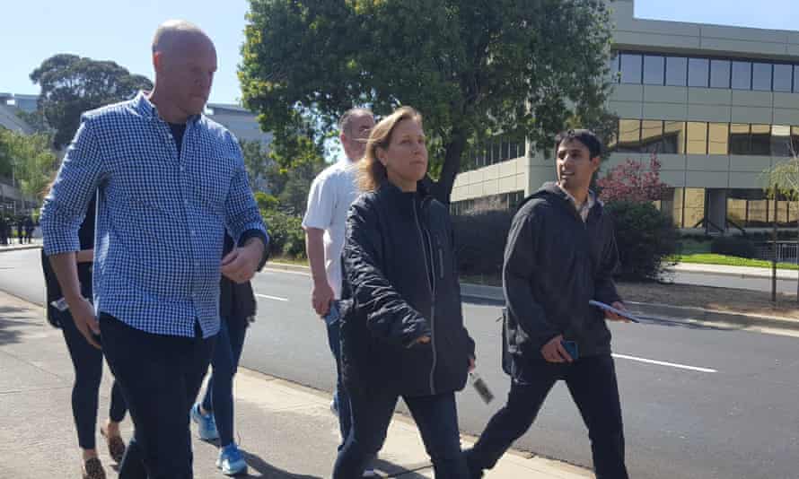 Susan Wojcicki, YouTube’s CEO, exits the building after the shooting was reported.