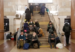 People take shelter in a subway station in Kyiv, Ukraine