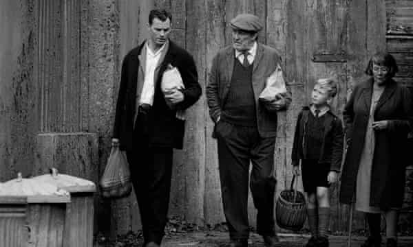 Left to right, Jamie Dornan, Ciaran Hinds, Jude Hill, and Judi Dench in the film Belfast.