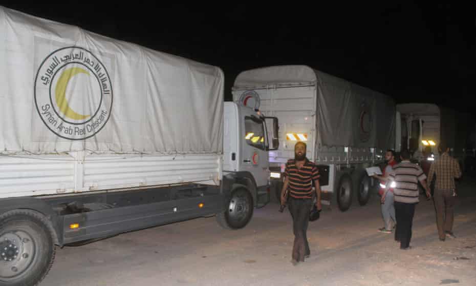 A UN and Syrian Arab Red Crescent aid convoy enters Darayya late on Thursday.