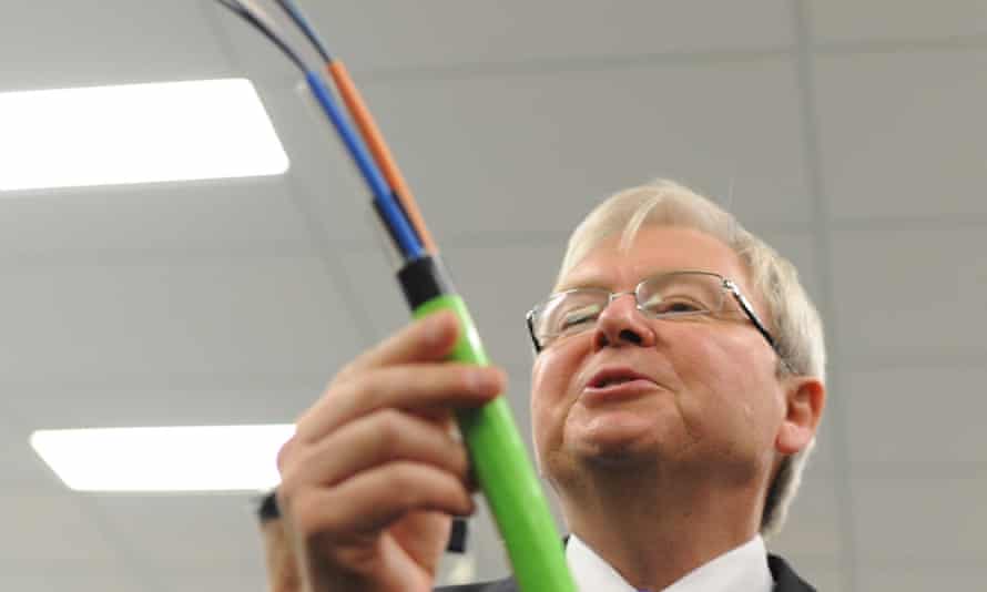 Kevin Rudd looks at a fibre optic cable