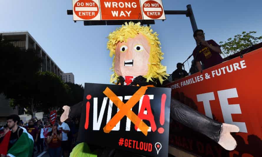 Protesters hold an effigy of Donald Trump during a May Day rally in Los Angeles, California.