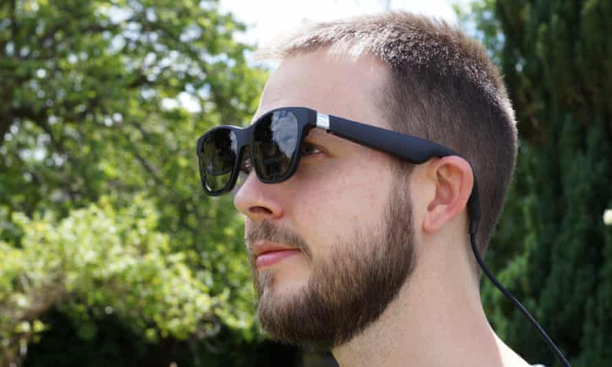 A man wearing the Nreal Air glasses.