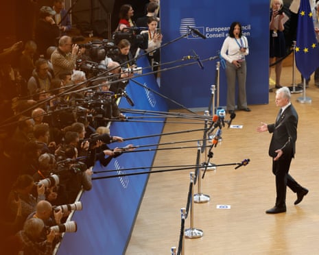 Lithuania’s President Gitanas Nausėda speaks with the media as he arrives for the EU summit at the European Council building in Brussels.