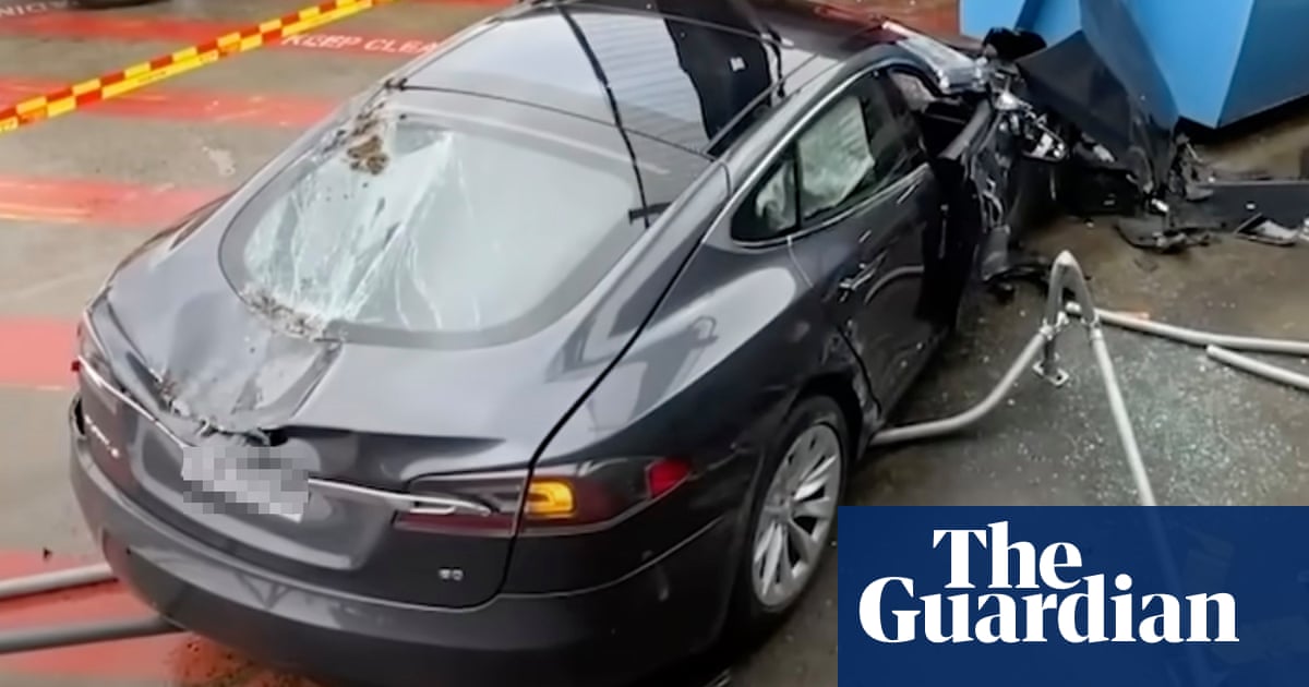 Runaway Tesla crashes into three cars and drives off rooftop at Sydney shopping centre car park