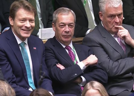 From left: the Reform MPs Richard Tice, Nigel Farage and Lee Anderson in the House of Commons during PMQs
