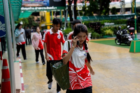 Students are evacuated from the site of the school shooting.