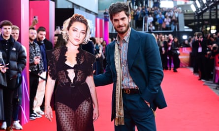 Andrew Garfield with a Florence Pugh cutout at the We Live in Time London premiere.