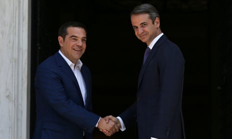 Newly-appointed Greek prime minister Kyriakos Mitsotakis (right) with the outgoing leader Alexis Tsipras in Athens.