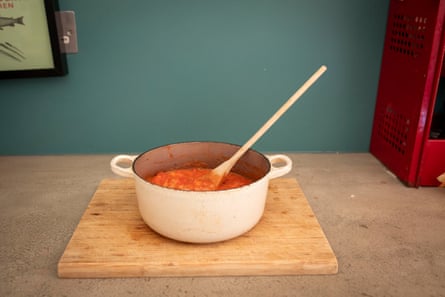 Tomato sauce in a Le Creuset pot.