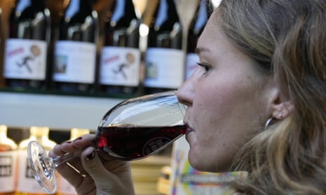 Fresh start: a customer drinks a glass of Beaujolais Nouveau wine in Les Enfants du Marche restaurant, in Paris. Each year, on the third Thursday in November at the stroke of midnight, the world welcomes in the new Beaujolais Nouveau vintage.