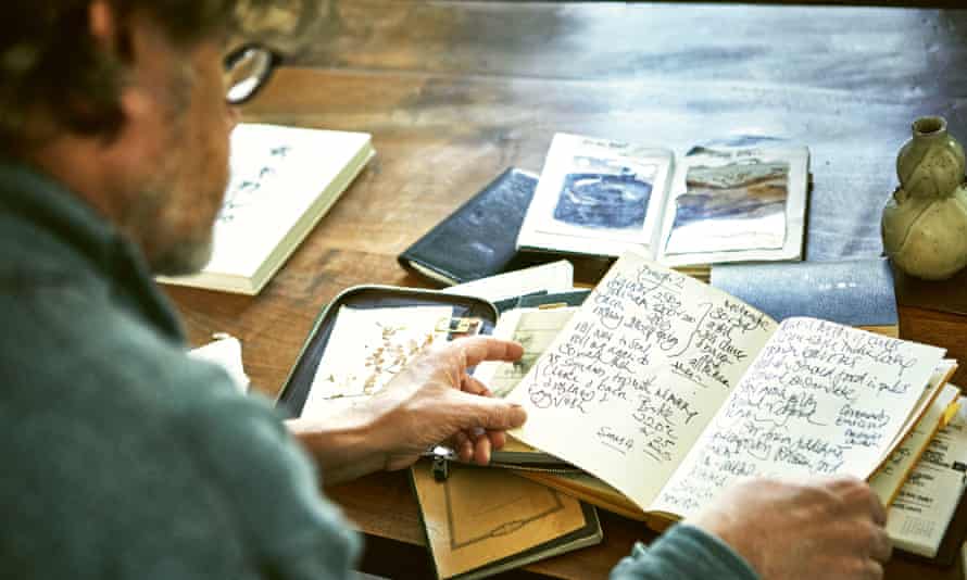 Nigel Slater with his recipe notebooks.
