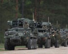 Source-feed image associated with Trump pledges an additional 5,000 troops for Poland in apparent u-turn