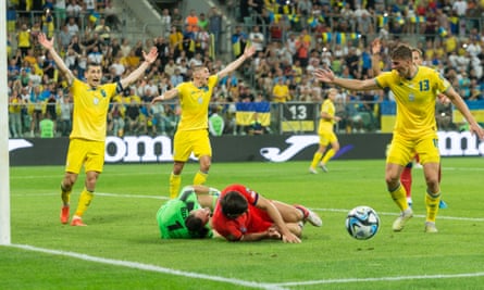 Harry Maguire on the ground for England against Ukraine