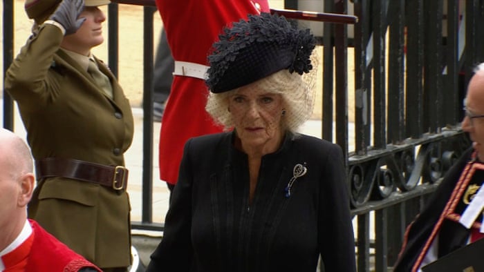Camilla, the Queen Consort, arrives for the funeral service.