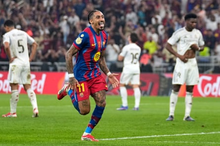 Raphinha celebrates after scoring his second goal in the Super Cup final against Madrid