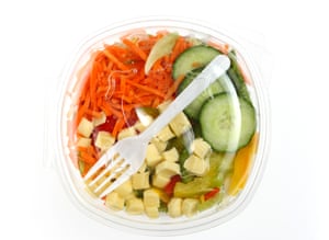 plastic lunch container with a mixed salad within